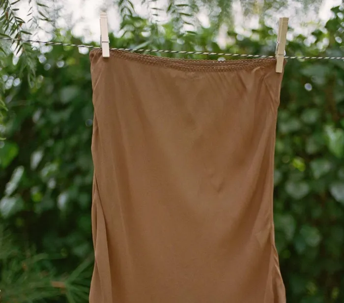 Shop MINI SKIRT SLIP Carob DEN Delicates and Sleepwear