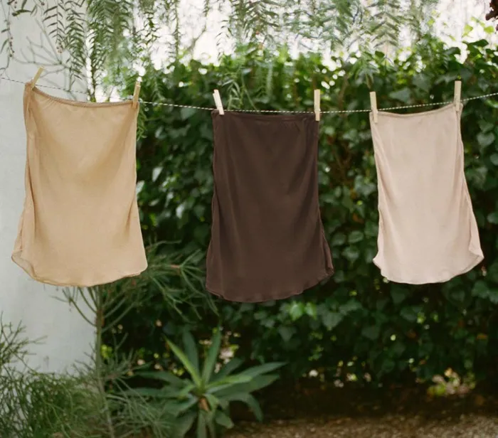 Shop MINI SKIRT SLIP Umber DEN Delicates and Sleepwear